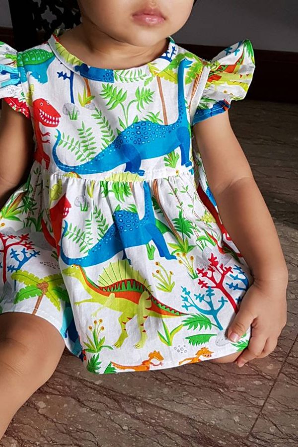 Attached dress with flutter sleeves Attached dress with flutter sleeves